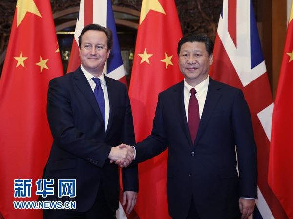 12月2日，國家主席習近平在北京釣魚臺國賓館會見英國首相卡梅倫。 新華社記者 鞠鵬 攝