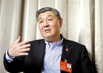 今年全國兩會期間，全國人大代表、浙江高院院長齊奇接受記者采訪。新京報記者 陳杰 攝