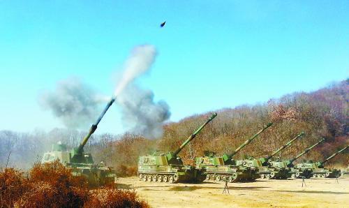 延坪島炮擊事件3周年之際，朝韓間口水仗不斷。圖為韓軍21日舉行應(yīng)對(duì)挑釁訓(xùn)練。