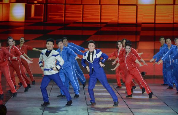 《小蘋果》、《最炫民族風》等廣場舞曲將會有全國統(tǒng)一、編排科學、帶給人正能量的全新動作。 CFP 資料