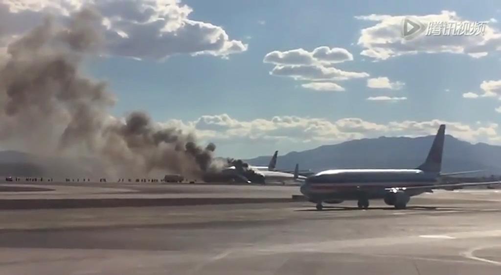 英國航空公司飛機(jī)跑道上起火 乘客死里逃生